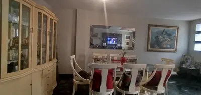 a dining room with a table and some chairs at Habitación H2, TV y WIFI cerca a Barranco in Lima