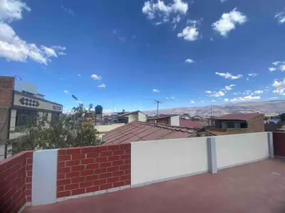 a view of a city from the roof of a building at Casa Elizabeth in Huancayo