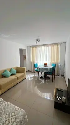 a living room with a couch and a table at loft apartament residencial ICA in Ica