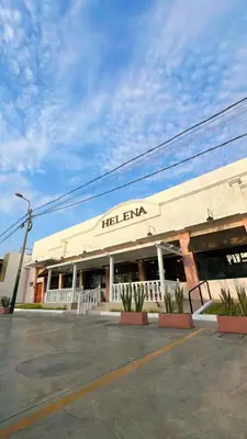 a building with a heal exit sign on it at Loft Huacachina center ica in Ica