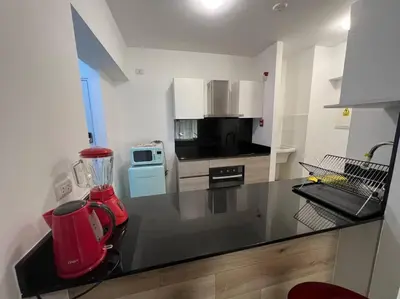 a kitchen with a counter with a blender on it at Amplio, Bonito , Silencioso y céntrico en Miraflores in Lima