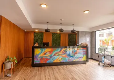 a large flat screen tv in a living room at Estreno en barranco BR1 in Lima