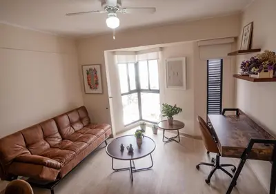 a living room with a couch and a table at Estreno en barranco BR1 in Lima
