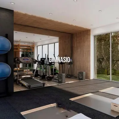 a gym with treadmill and ellipticals in a room at Alojamiento Mama Ocllo in Lima