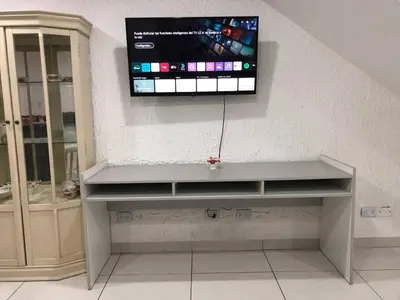 a flat screen tv hanging on a wall at Departamento en corazón de Miraflores in Lima
