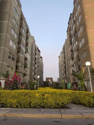a row of tall apartment buildings in a city at Departamento en Ate in Lima