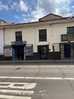a building on the side of a street at Redys House in Cusco