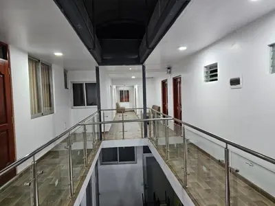 an empty hallway with a staircase in a building at Casa Rustica Hostal Paqcha in Cusco