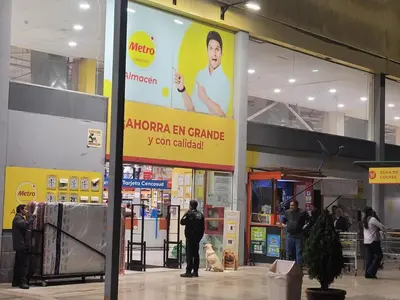 a billboard in a shopping mall with a woman on it at Arleth's hosting in Lima