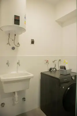a bathroom with a sink and a white sink at Vital by Wynwood House in Lima