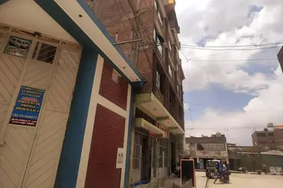 a building on the side of a street at Depawanka 3 Departamento amoblado y equipada in Huancayo