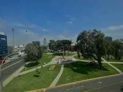 an aerial view of a park in a city at Residencia Monterrico in Lima