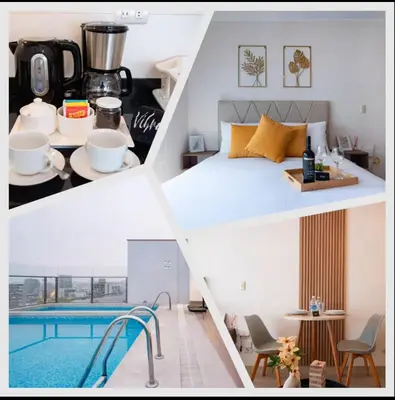 a hotel room with a bed and a swimming pool at G15 Apartments by Vibrant in Lima
