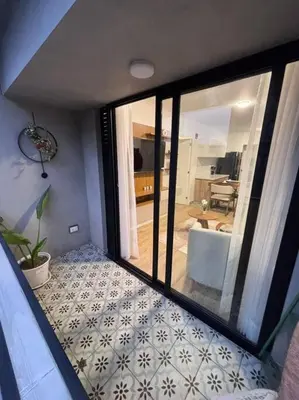 a room with a view of a living room at Apartamento full equipado en barranco in Lima