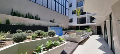 a courtyard of a building with potted plants at Apartamento en Miraflores in Lima