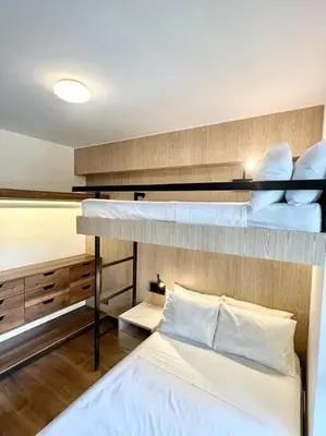 a bedroom with two bunk beds in a room at Deluxe Apartment in San Isidro in Lima