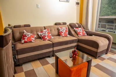 a living room with a couch and a table at Apartamento La Merced in La Merced