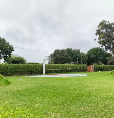 a soccer field with a net in the grass at Casa de campo en Hacienda San Andres in San Andrés