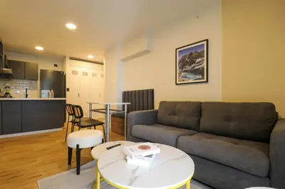 a living room with a couch and a table at Moreyra by Wynwood House in Lima