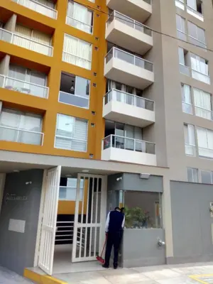 a man standing outside of a building at Benito in Lima