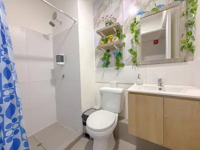 a bathroom with a toilet and a sink at Exclusivo con vista al mar - Blue One in Lima