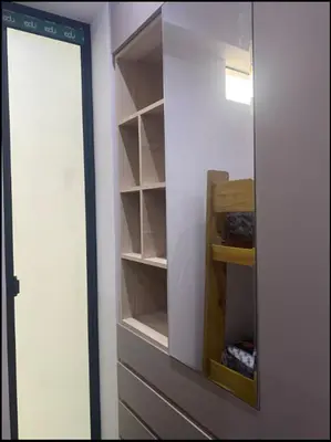 a closet with a mirror in a room at Apartamentos como en casa in Chancay
