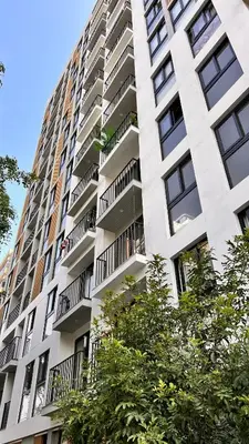 a tall building with balconies on the side of it at Lima Limón in Lima