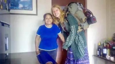 a woman and a girl standing in a kitchen at A great experience in the South cone of Lima! in Lima