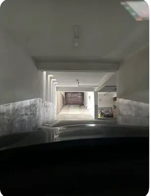 a dark room with a tunnel in a building at Comodidad y Exclusividad in Lima