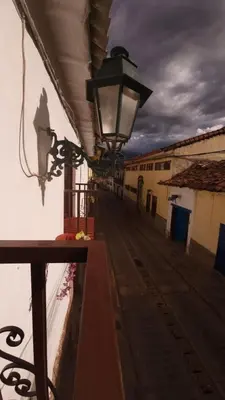 a street light on the side of a building at Antuquita's House in Cusco