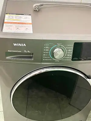 a close up of a washing machine on a counter at Entire House close to the sea Miraflores in Lima