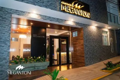 a mexican restaurant with a sign above the door at Grand Hotel Megantoni in Quillabamba