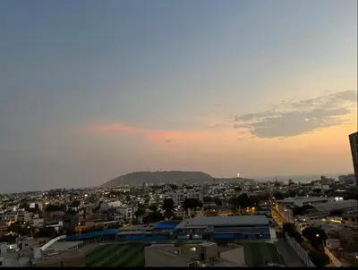 a view of a city at sunset at Luxury Barranco Pool Zoe in Lima