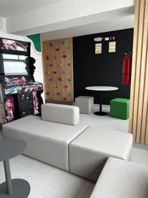 a living room with white furniture and a table at Luxury Barranco Pool Zoe in Lima
