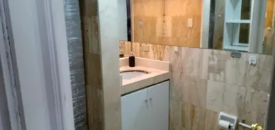 a bathroom with a sink and a mirror at Habitación A1 Trabajar Kitchenette y baño privado in Lima