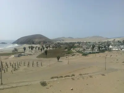 a view of a beach with a town and the ocean at Relaxing Bungalow in Santa Rosa