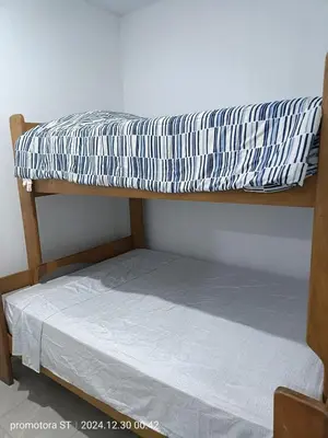 a bunk bed with a mattress on top of it at Mirador sur in San Bartolo