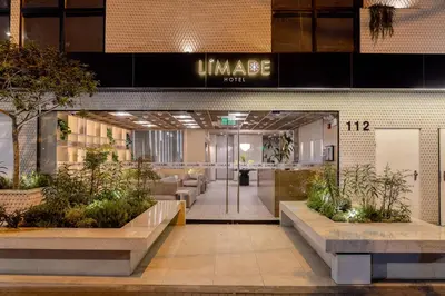 a lobby of a furniture store with plants at Hotel Límade in Lima