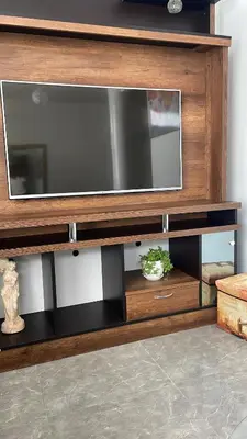 a entertainment center with a tv on top of it at Hermoso Departamento en el mejor sector de Ica in Ica
