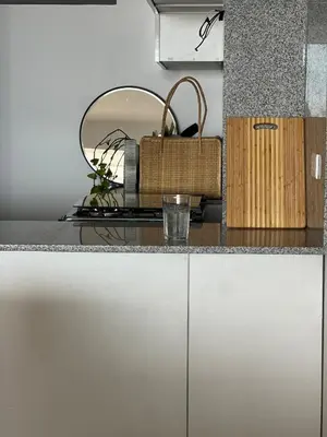 a counter top with a mirror and a basket on it at Ocean View Premiere Depa Naplo in Naplo