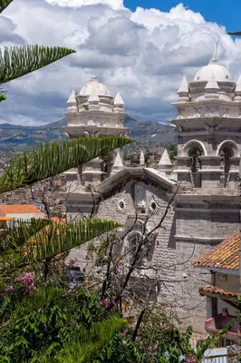 a building with two domes on top of it at Casa Munayki in Ayacucho