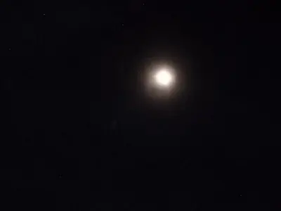 a moon in the sky at night at Hotel House in Perú 2 in Urubamba