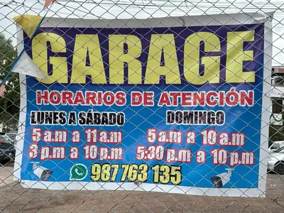 a sign on a fence that saysarma at Adela's Home in Cusco