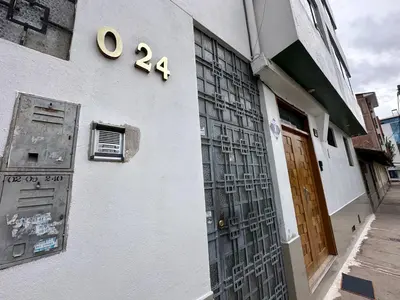 a building with a door with the number on it at Adela's Home in Cusco