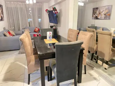 a dining room with a table and chairs at El encanto de viajar in Lima