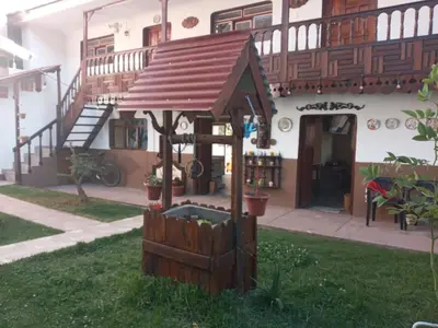 a gazebo in the yard of a building at Hospedaje CASABLANCA URUBAMBA in Urubamba