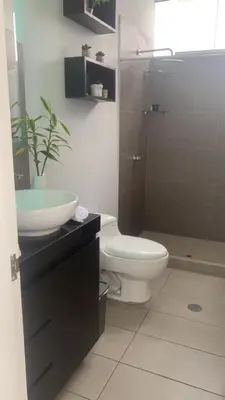 a bathroom with a toilet and a sink at Dolphin house 915 in Punta Negra