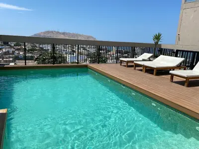 a swimming pool on top of a building at Monumental BR1 in Lima