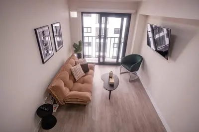 a living room with a couch and a table at Barranco Moderno Style 1BR in Lima