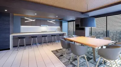 a kitchen with a table and chairs in a room at 2BR Deluxe Apartment in San Isidro in Lima